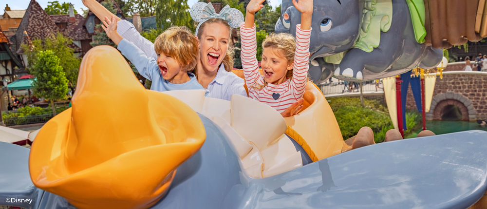 Guests On Dumbo The Flying Elephant, Disneyland® Park